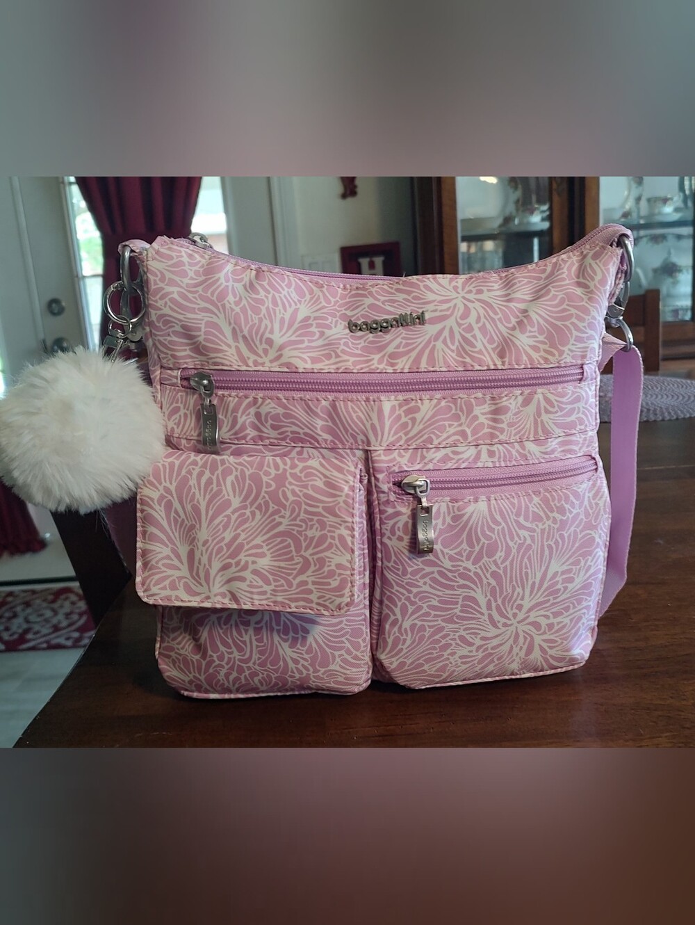 Baggallini Pink Floral Crossbody Bag with White Pom-Pom